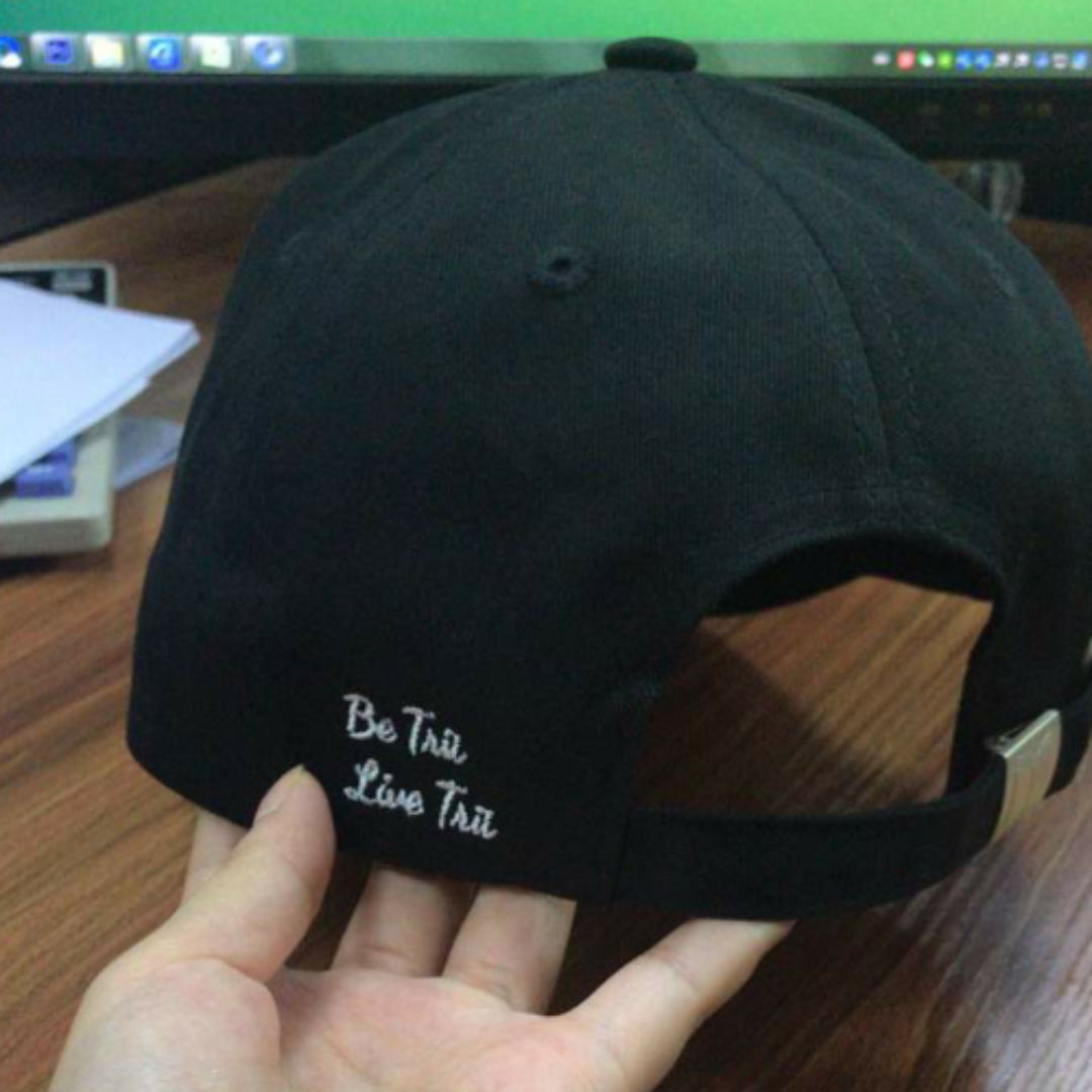 Picture of  the Trü Scrypted Black Rose Dad Hat from the back view.