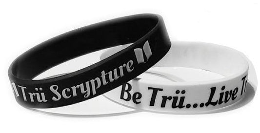 Black and White wristbands that feature not only the Trü Scrypture name but the Fashion book logo along with the slogans Be Trü...Live Trü.