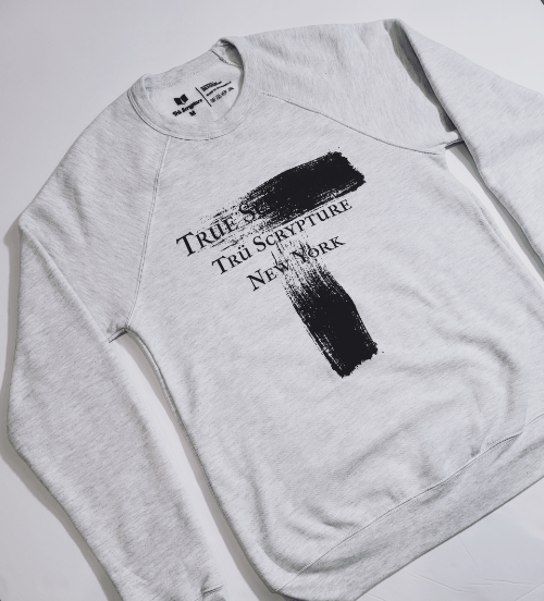 Picture of the Trüly Correct crewneck from a side angle showing the dimensions of the crewneck.